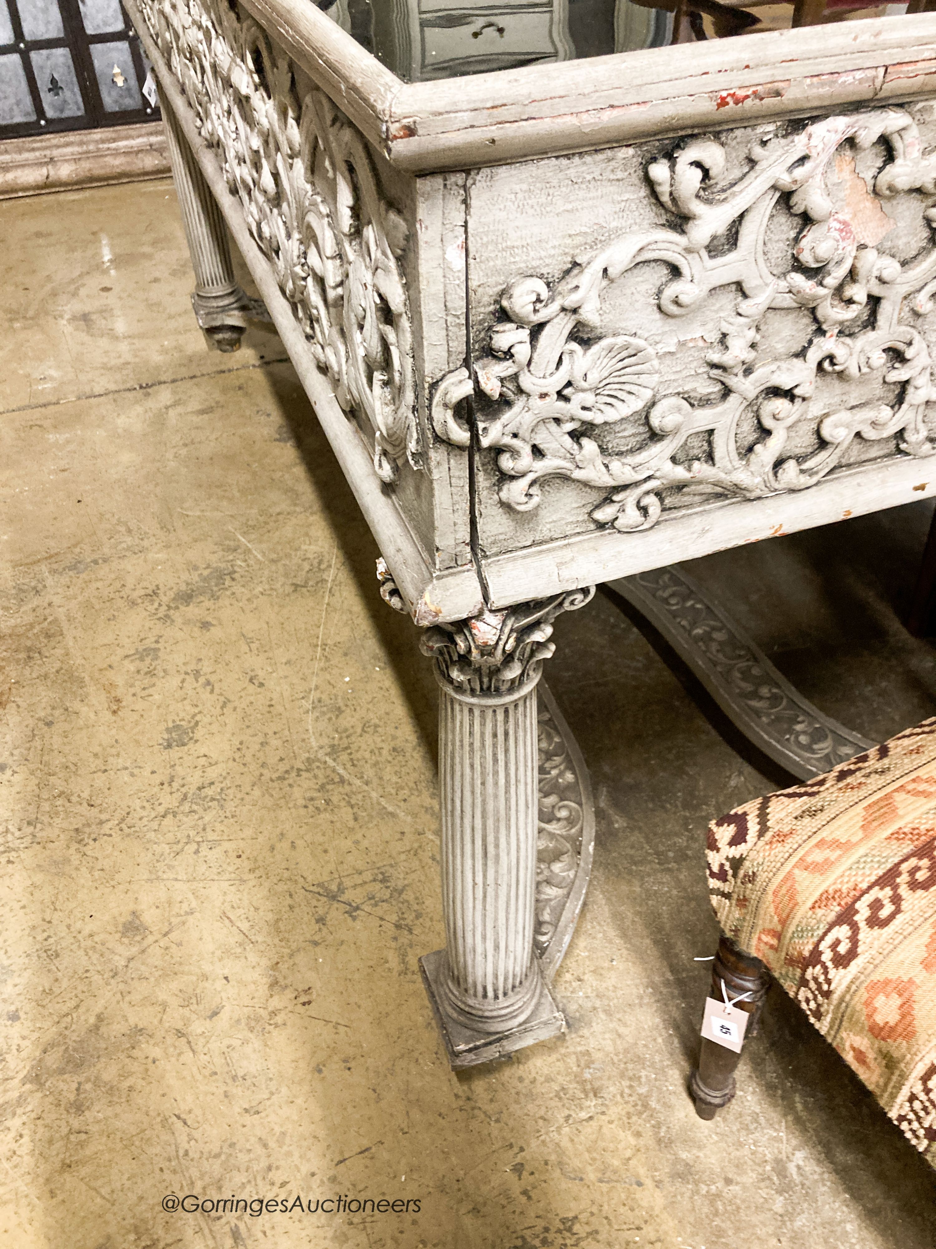 An 18th century style painted two drawer glass top console table, width 180cm, depth 73cm, height 95cm